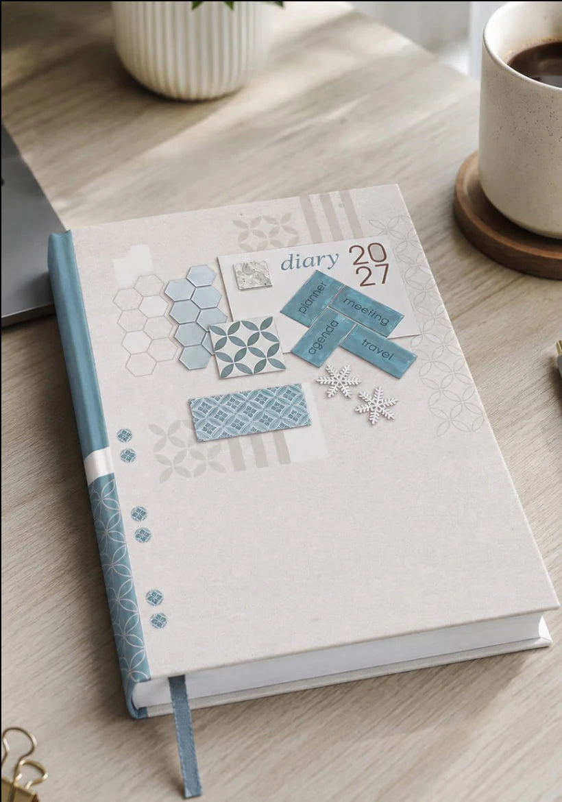 2027 cream and blue paper pasting executive diary V-337 with geometric cover design, planner-themed graphics, blue spine, and ribbon bookmark.