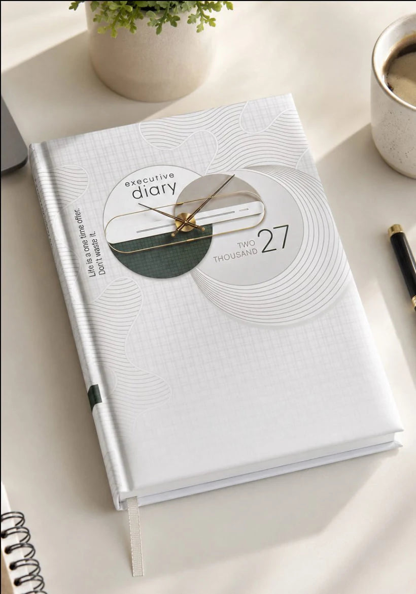 2027 white and silver paper pasting executive diary V-373 with geometric cover design, clock-inspired illustration, and ribbon bookmark.

